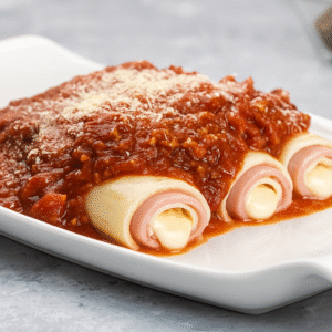 Canelones caseros de ricota, muzzarella y jamon 6 unidades